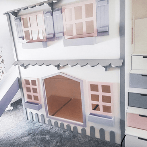 Custom-built cottage playhouse bed frame in white, pink, and light gray/lavender colors.